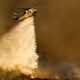 A helicopter combats the flames near Placerita Caynon Road.